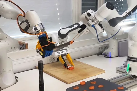 Three-armed kitchen robot cuts raw salmon with 95% touch-sensing accuracy