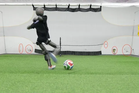Robot soccer player dents wall with terrifying kicks